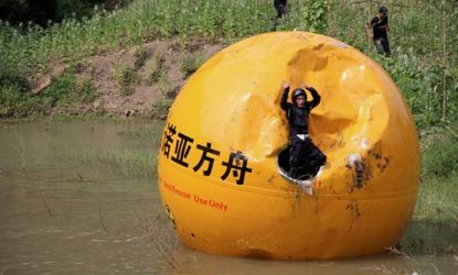 Inventor Yang Zongfu tests one of his anti-disaster bubbles in China.