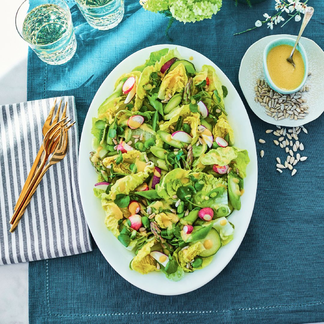 Spring salad recipe laid out on a plate in the sunshine