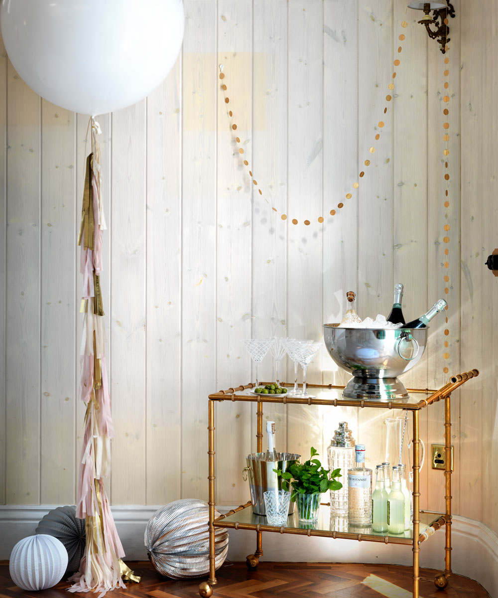 room with wooden wall and wheeled trolley