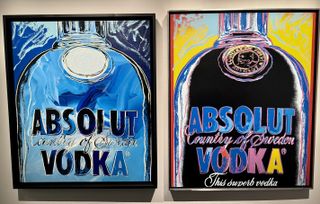 Two Andy Warhol Absolut vodka bottle paintings