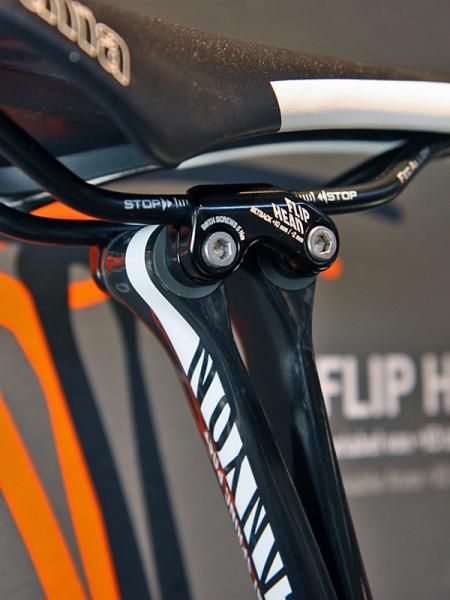 Tilt adjustments are super easy on Canyon's new VCLS Flat Spring Post - just loosen the seatpost collar, tilt the saddle by hand, then retighten. The two semicircular seatpost halves aren't connected so they're free to slide against each other when the collar isn't tight.