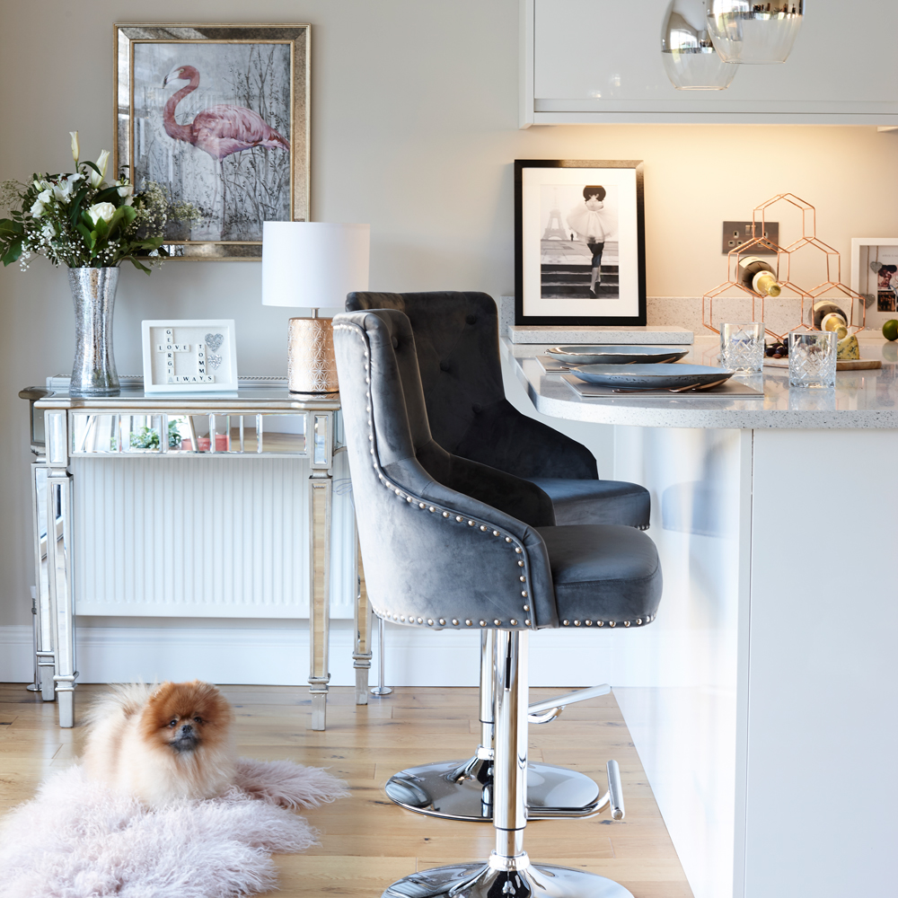 chair with lamp and flower vase