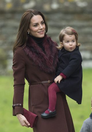 Catherine, Duchess of Cambridge and Princess Charlotte of Cambridge attend Church on Christmas Day on December 25, 2016 in Bucklebury