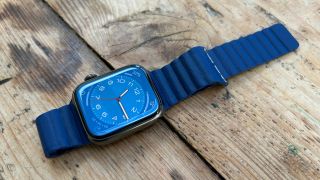 Apple Watch Series 8 with Watch Strap Company Leather Loop on wooden table