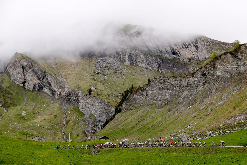 LA PLAGNE FRANCE JUNE 05 The peloton passing through mountain landscape during the 73rd Critrium du Dauphin 2021 Stage 7 a 1715km stage from SaintMartinLeVinoux to La Plagne 2072m Snow UCIworldtour Dauphin dauphine on June 05 2021 in La Plagne France Photo by Bas CzerwinskiGetty Images
