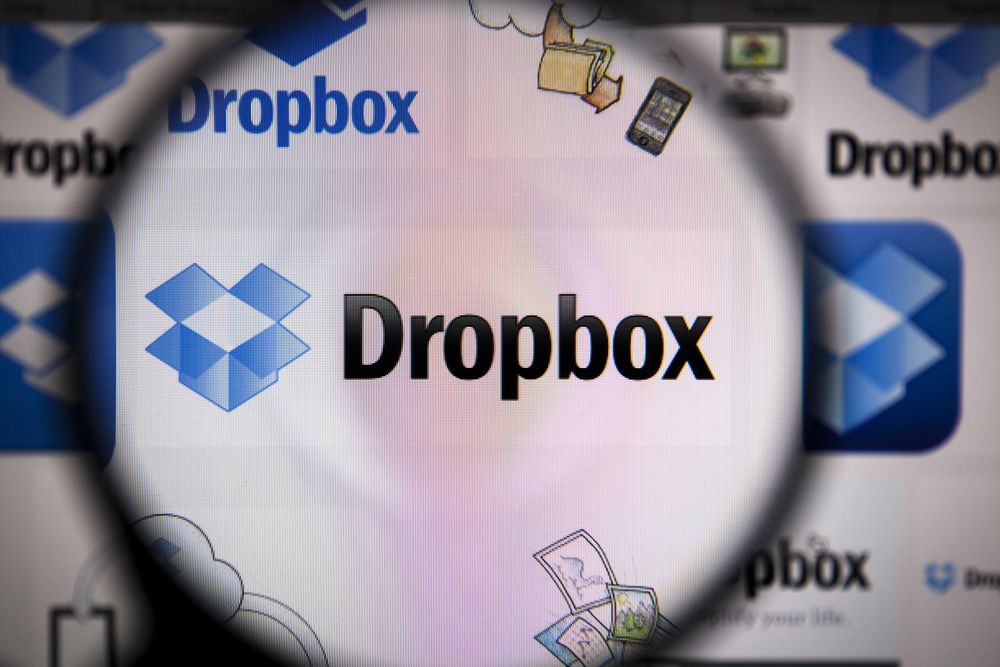 The Dropbox logo seen via a magnifying glass