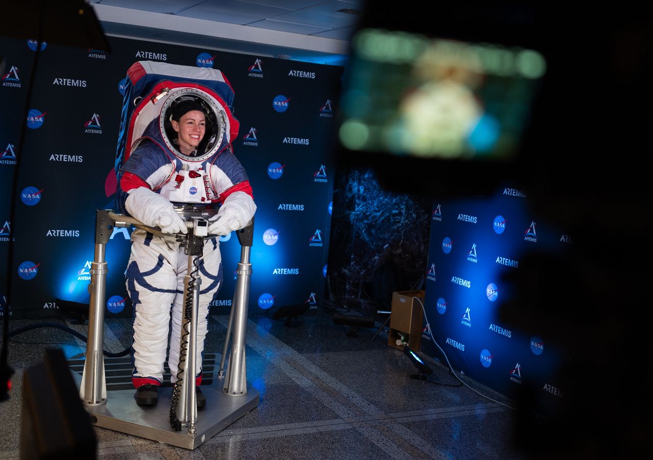 Kristine Davis, a spacesuit engineer at NASA&rsquo;s Johnson Space Center, wearing a ground prototype of NASA&rsquo;s new Exploration Extravehicular Mobility Unit (xEMU), is seen during a demonstration of the suit, Tuesday, Oct. 15, 2019 at NASA Headquarters in Washington.