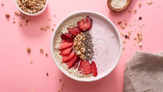 Strawberries in a smoothie granola bowl