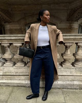 fashion influencer @nlmarilyn wears the glove shoe trend