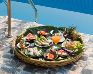 pool party ideas tray of food by pool