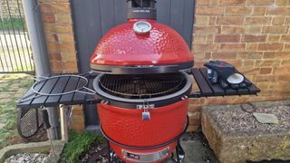 Kamado Joe Classic II being tested in a back yard