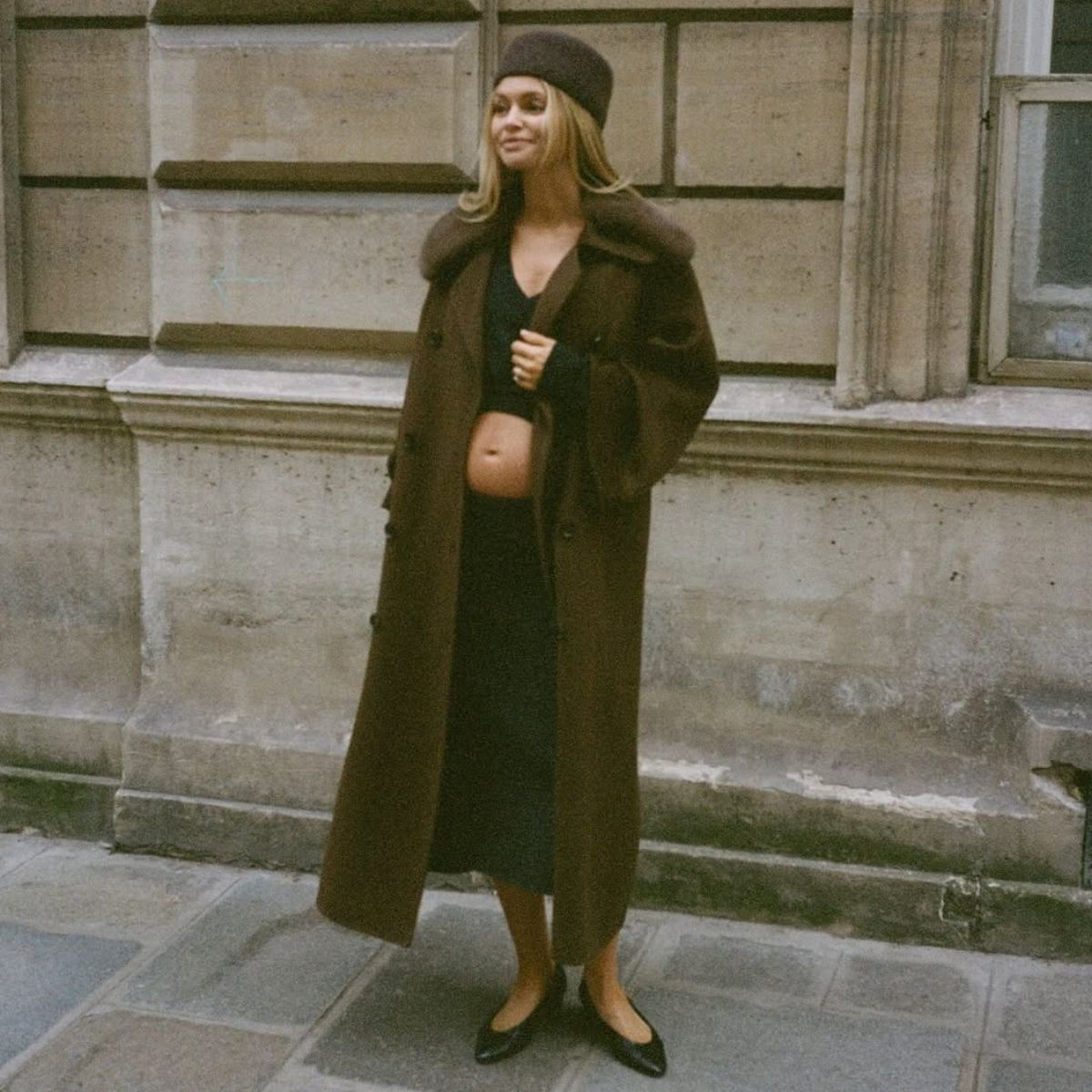 claire rose cliteur wearing a coat