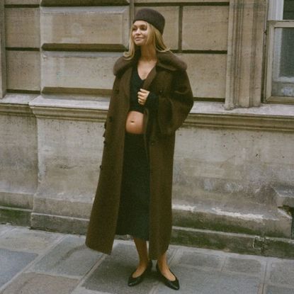 claire rose cliteur wearing a coat