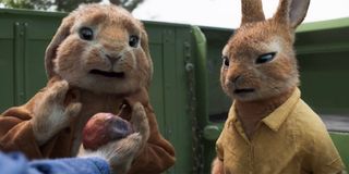 Two rabbits rejecting some rotten fruit in Peter Rabbit 2