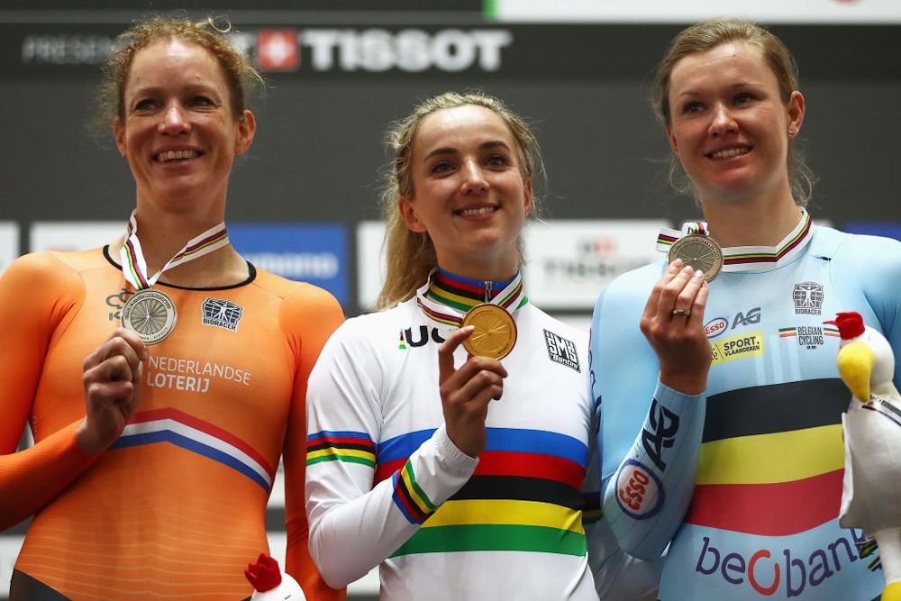 Kirsten Wild of the Netherlands (silver Medal), Elinor Barker of Great Britain with the gold medal and Jolien D'Hoore of Belgium (Bronze Medal) celebrate on the podium for the Women's scratch 10k