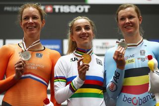 Kirsten Wild of the Netherlands (silver Medal), Elinor Barker of Great Britain with the gold medal and Jolien D'Hoore of Belgium (Bronze Medal) celebrate on the podium for the Women's scratch 10k