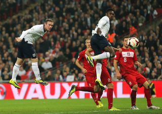 Wayne Rooney scores England's opener against Poland in 2013 (Nick Potts/PA).
