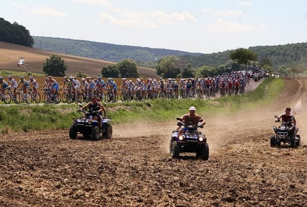 A few four-wheeled spectators accompanied the peloton on stage 12.