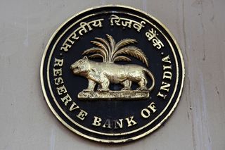 The logo of the reserve bank of India on the outside of a building