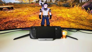 Baseus docking station with Steam Deck connected and Fable: The Lost Chapters gameplay on back monitor