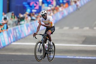 Charles Kagimu (Uganda) finishes the men's road race at the Paris Olympics