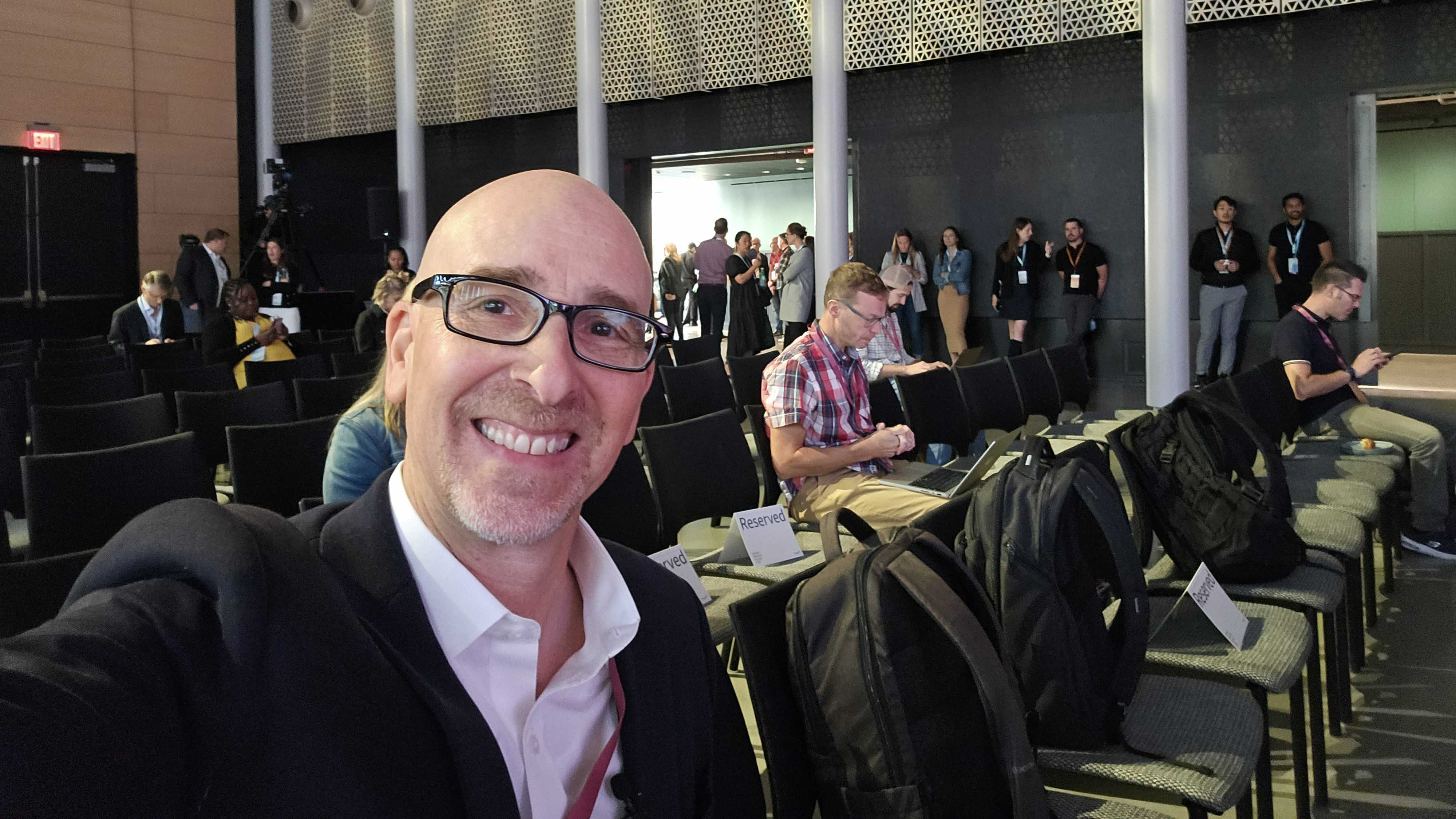 Lance Ulanoff sits in front of seats at the Amazon event