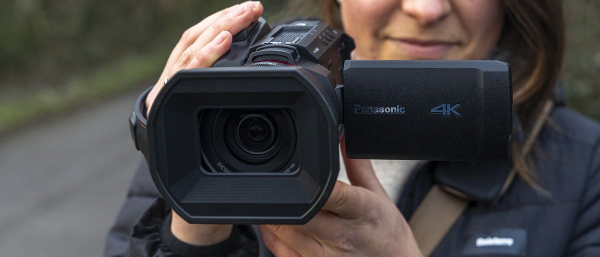 The Panasonic HC-X1500 camcorder in a female photographer&#039;s hands