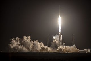 After its June 30, 2021 launch, SpaceX paused Starlink liftoffs to add lasers to the satellites. In this photo, a SpaceX Falcon 9 rocket blasted off from Florida on Feb. 15, 2021, during a successful Starlink launch.