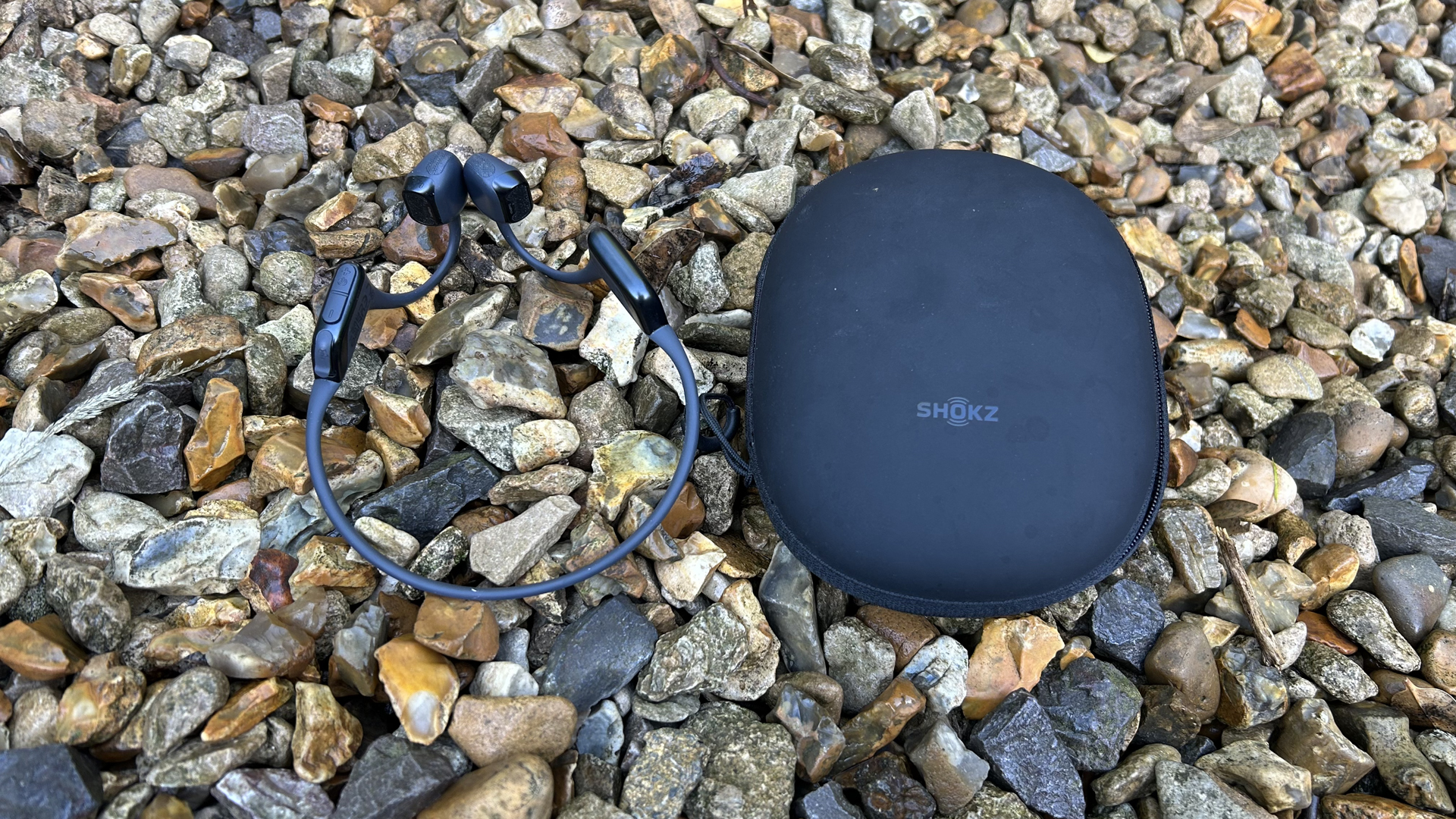 The Shokz OpenRun Pro 2 headphones with case