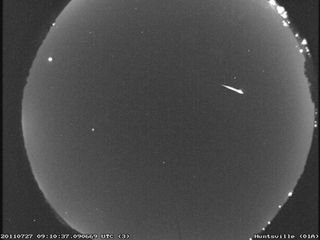 A bright Perseid meteor crosses the sky over Huntsville, Ala. on July 26, 2011.