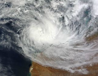 On March 13, 2012 at 0245 UTC, the MODIS instrument on NASA's Terra satellite captured this visible image of Tropical Cyclone Lua (17S) over Western Australia. The highest, strongest thunderstorms appear to be on the southern side of the circulation, as the higher storms are casting shadows on the lower surrounding clouds