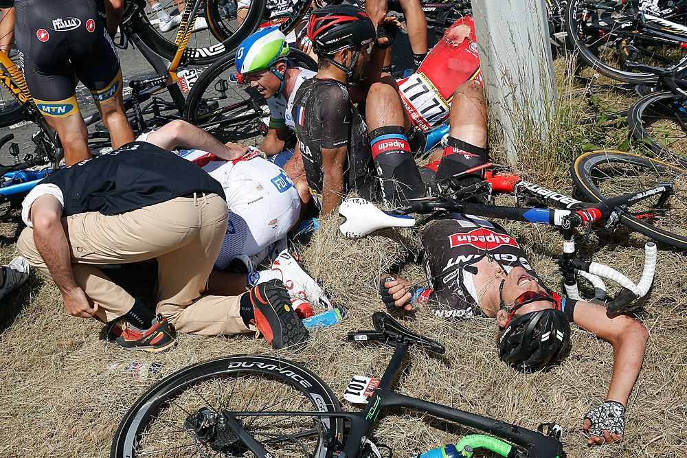 William Bonnet (FDJ) attended to as Ramon Sinkeldam (Giant-Alpecin) gathers himself