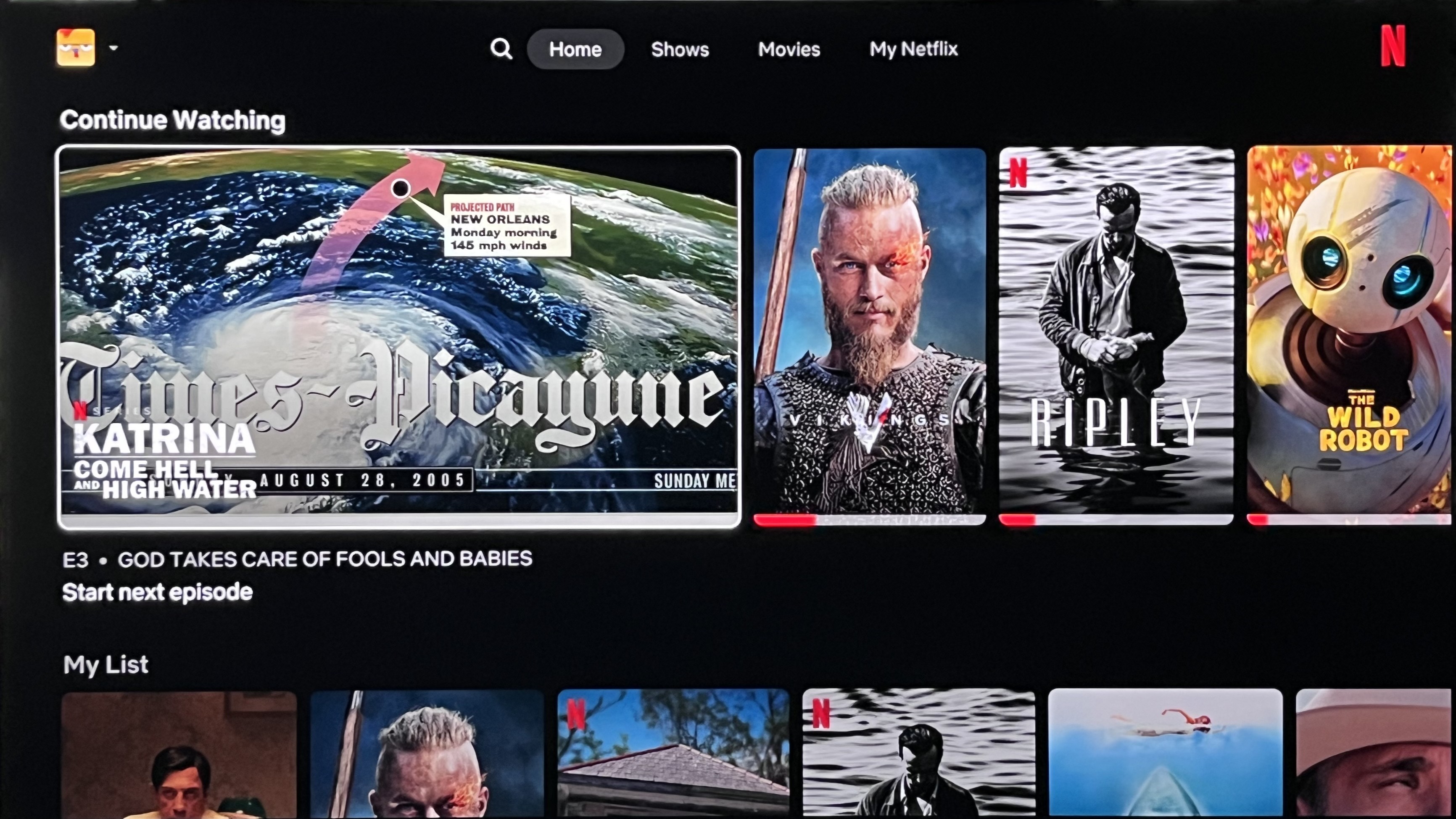 Netflix interface showing expanded program tile in continue watching row