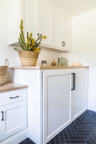 small laundry room ideas hidden appliances by Lindye Galloway