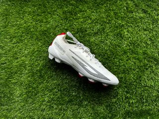 Sokito Scudetta football boots reviewed. The boots are placed on a piece of turf ahead of being reviewed. 