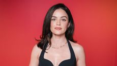 lucy hale on a red background
