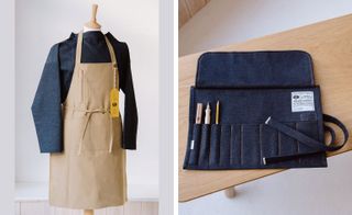 Left, a clothing mannequin with a long sleeved blue denim shirt and a light brown apron on it. Right, a denim book bag with pen holders on a wooden surface.