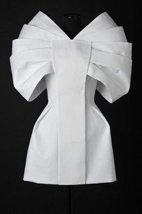 Another famous Istanbul flower, evoked in the form of Dice Kayek's crisp white cocktail dress