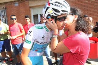 Fabio Aru gets a good luck kiss from his mother, Antonella, before the start of stage 18.