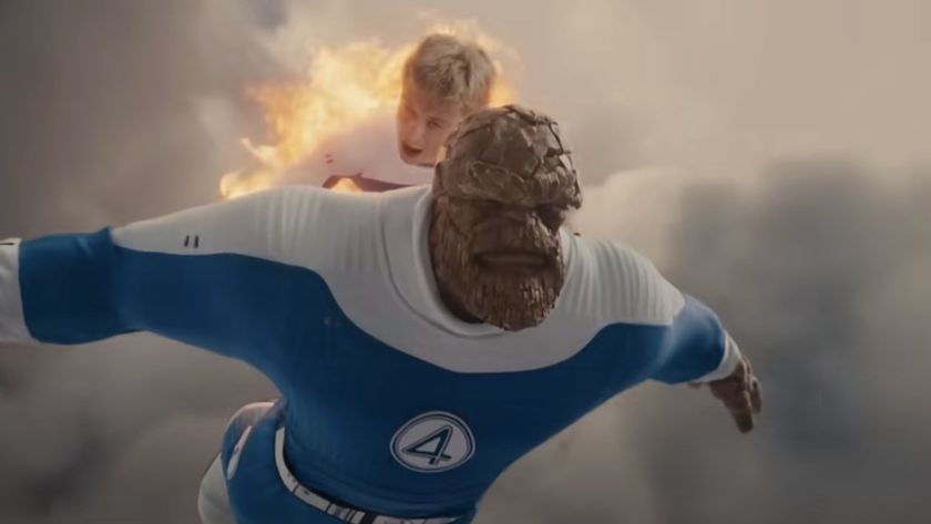 Johnny Storm flying a rocky bearded Ben Grimm through the air in The Fantastic Four: First Steps