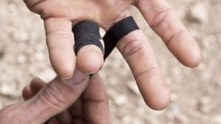 what is climbing tape used for: taped up fingers