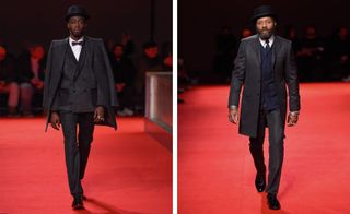 Two male models walking red carpet with suits and top hats