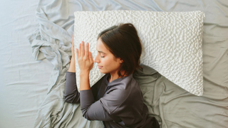 Woman sleeping on a side sleeper pillow