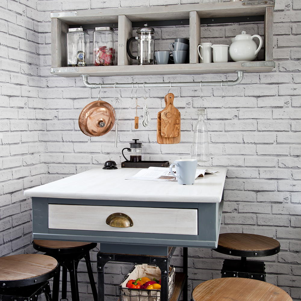 room with white teapot wooden stool and chopping pad