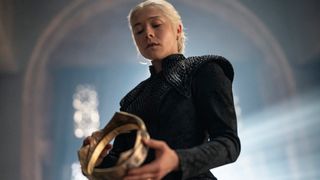 Rhaenyra (Emma D'Arcy) holding the crown in a promotional still for "House of the Dragon" season 3
