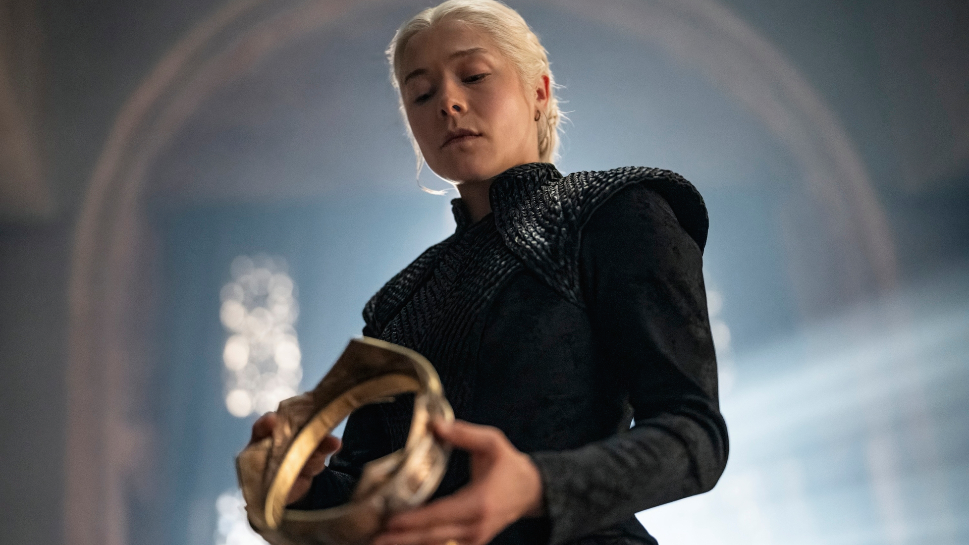 Rhaenyra (Emma D'Arcy) holding the crown in a promotional still for "House of the Dragon" season 3