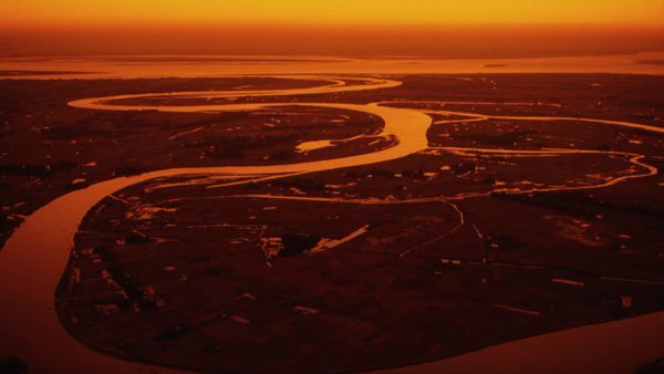 A view of the Ganges River Delta close to the Bay of Bengal at sunset.