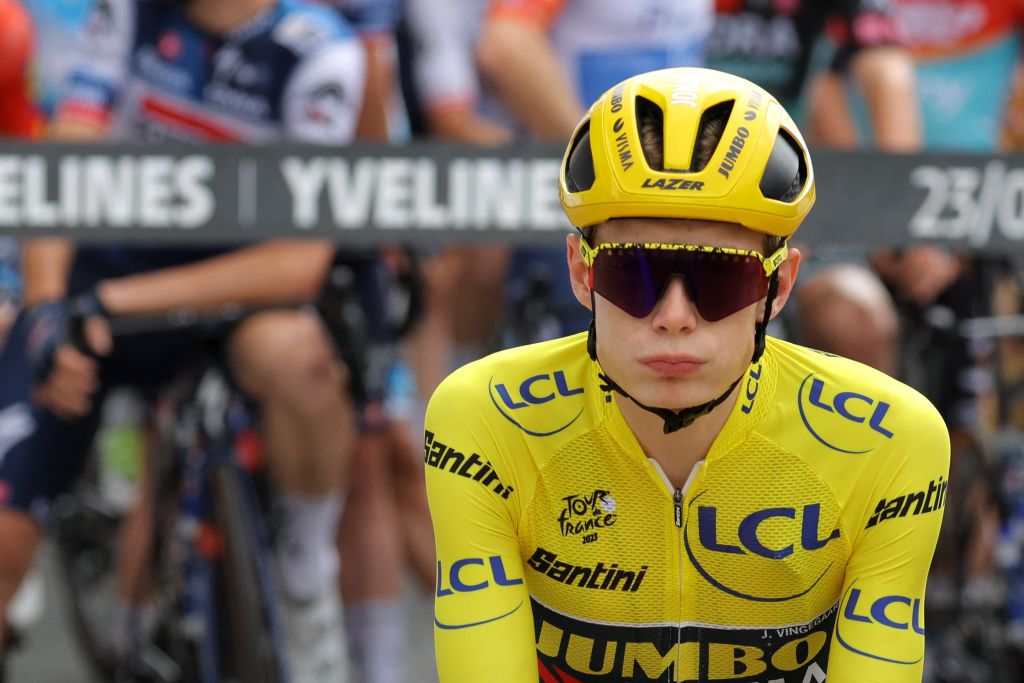 Jumbo-Visma&rsquo;s Jonas Vingegaard wearing the overall leaders yellow jersey awaits the start of stage 21