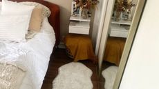 IKEA white faux sheepskin rug beside Annie's bed in her bedroom