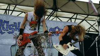Jason Newsted (left) and James Hetfield perform at the Monsters of Rock festival at Donington Castle on August 22, 1987